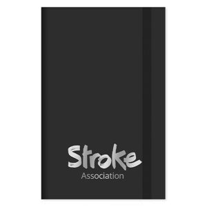 Black notebook with Stroke Association logo on it