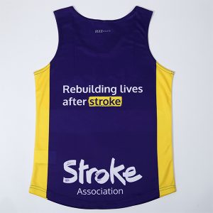 Purple and yellow running vest with the words "Rebuilding lives after stroke"